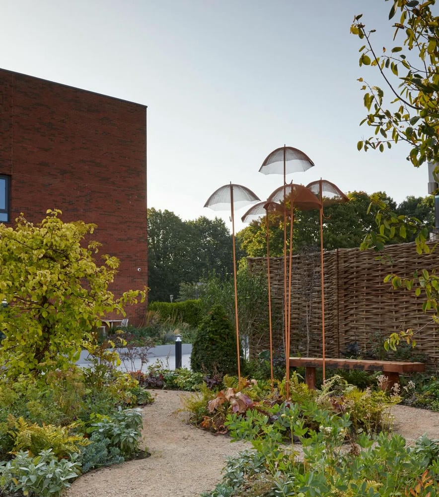 Umbreallas made from mesh are displayed in the campus of Liverpool 2025.