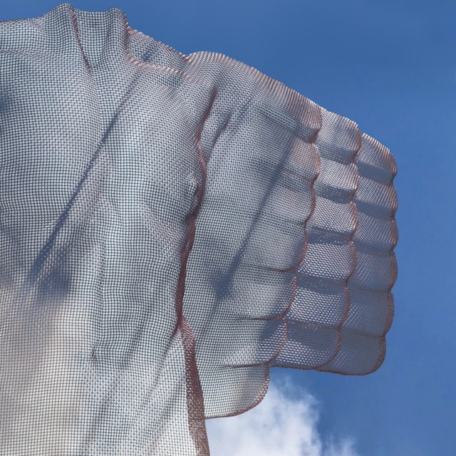 Detail of an angel sculpture made from wire-mesh