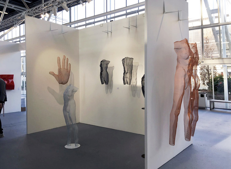 Art fair in Italy - booth with nude wire-mesh sculptures