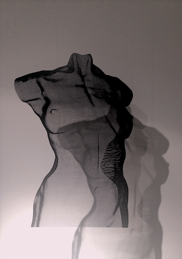 Torsosculpture installed with spotlight