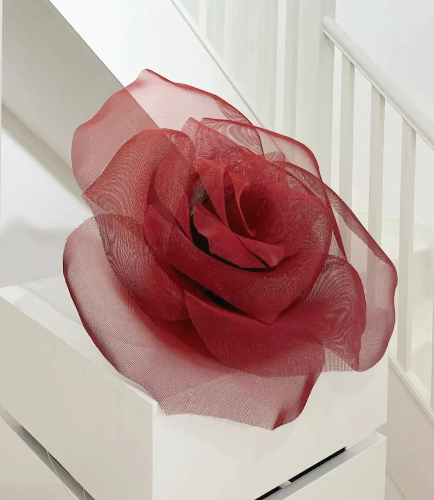 rose sculpture on plinth e