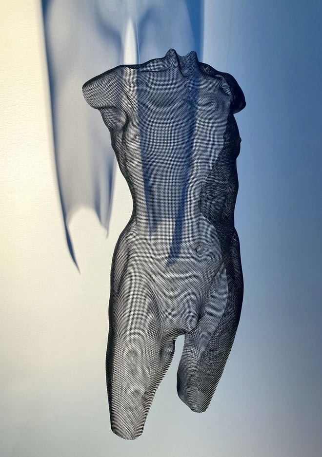 Front view of a male torso as a floating artwork - by artist David Begbie