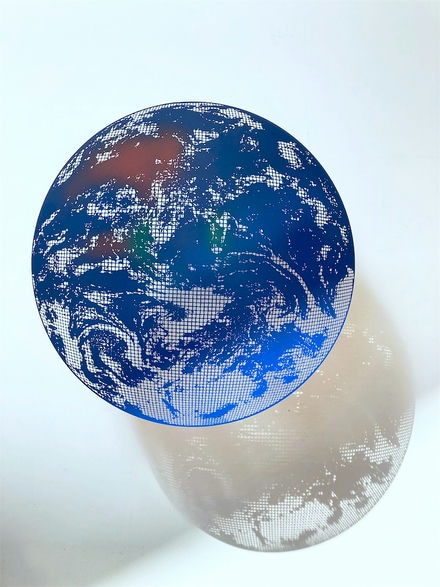 Our planet as a suspended sculpture