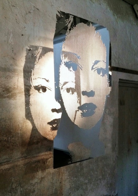 Steel Sculpture of a female face